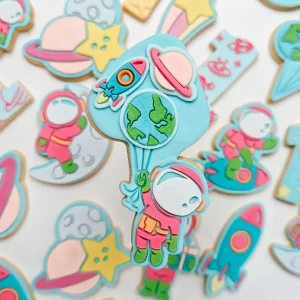 Astronaut hanging from balloons cookie stamp and cutter